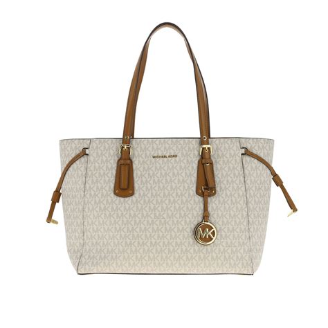 michael kors cream handbag|michael kors cream tote bag.